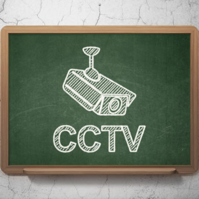 Safety concept: Cctv Camera icon and text CCTV on Green chalkboard on grunge wall background, 3d render